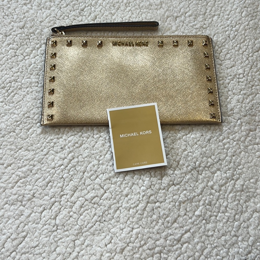 Gold wristlet michael kors